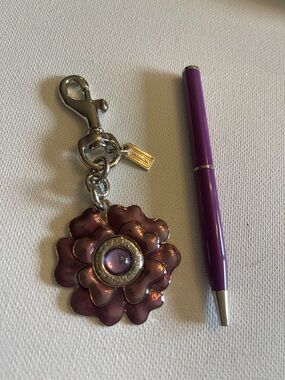 Coach Metallic Purple Flower Charm Keychain and Coach Pen